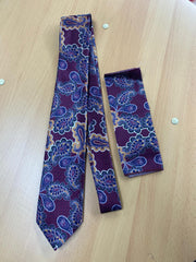 Purple tie with pattern