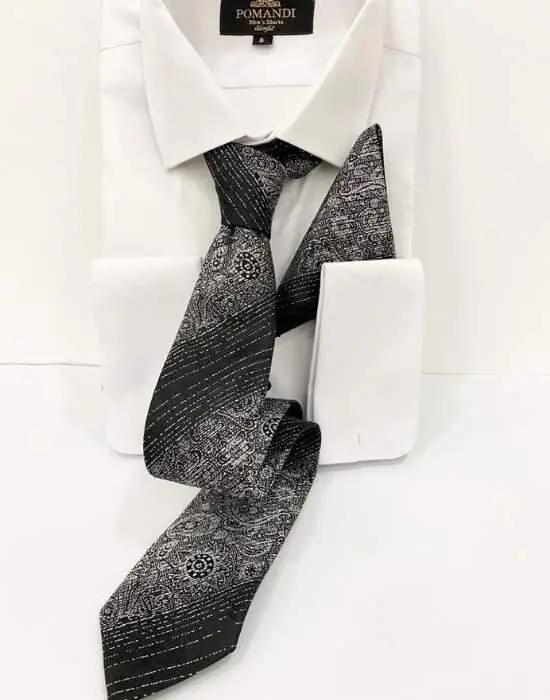 Chemise blanche avec cravate noire à motifs élégants