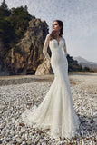 Mermaid wedding dress with long sleeves and open back